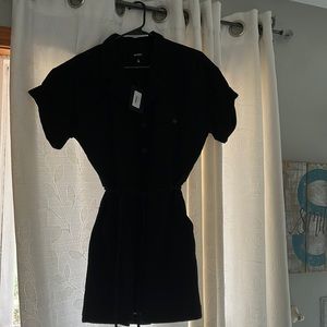 Black romper size medium brand new with tags